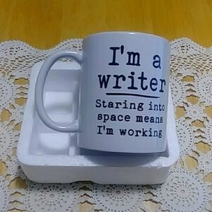 Humorous coffee cup, I'm a writer...